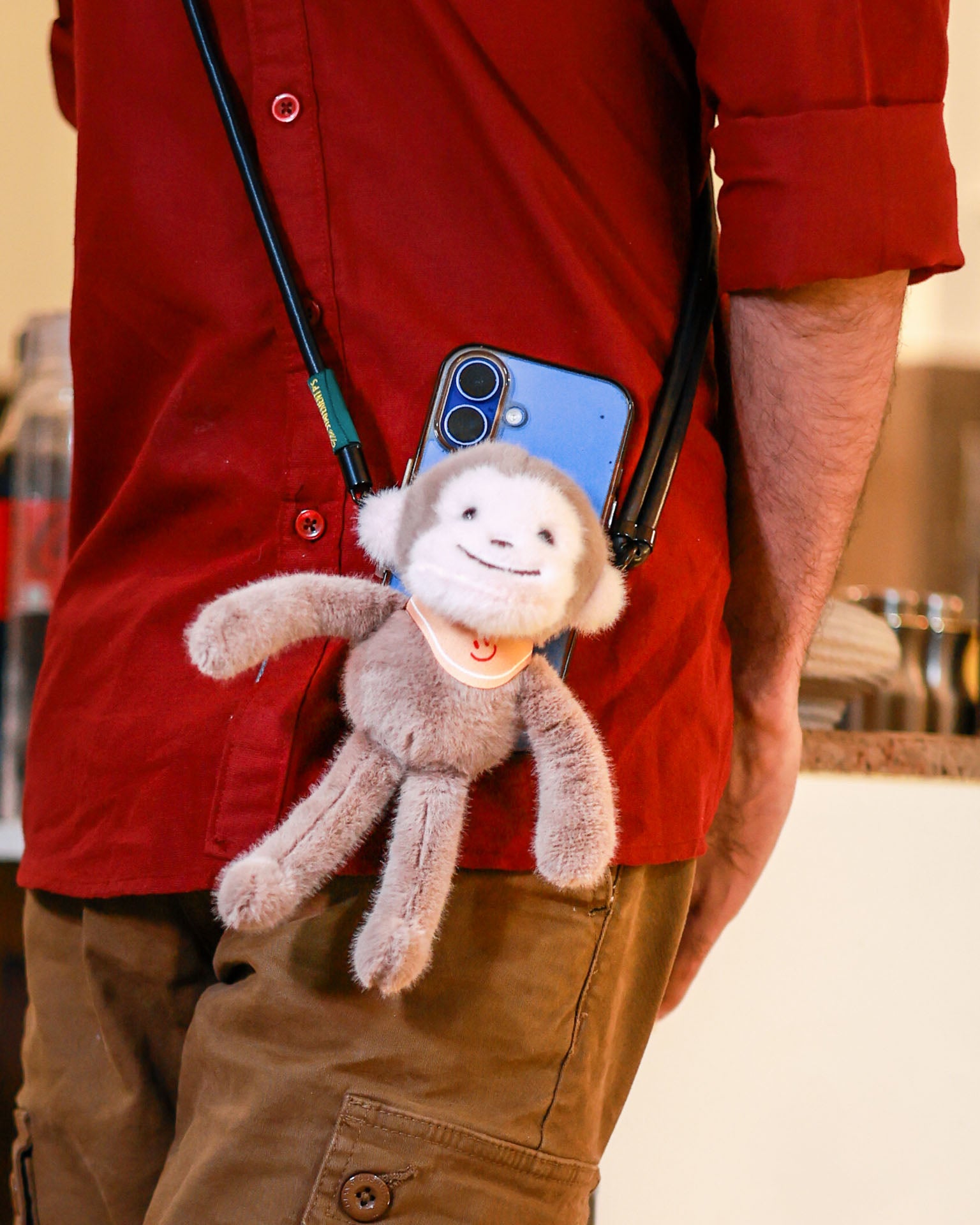 The Monkey Business plush lanyard for phone â€“ soft Monkey charm, quirky phone accessory