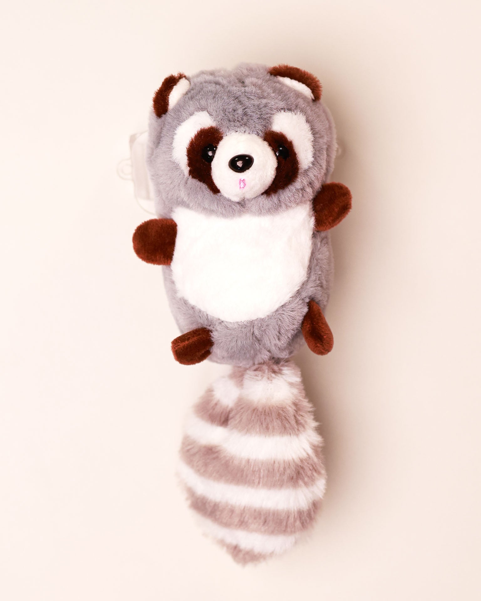 The Bandit-1 plush lanyard for phone â€“ soft Raccoon charm, quirky phone accessory